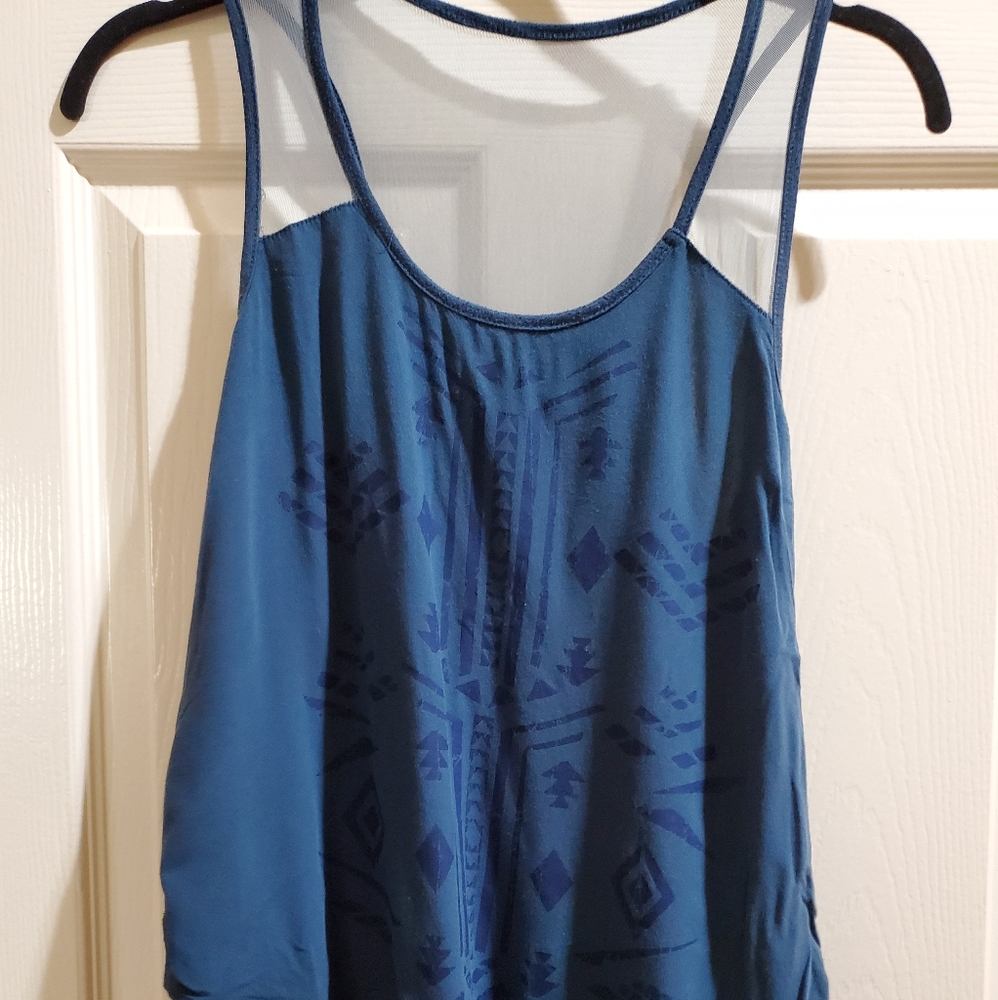 Junior teal top with sheer sleeveless tank
